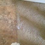 Carpet damage at tile