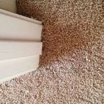 Carpet repair at door jam
